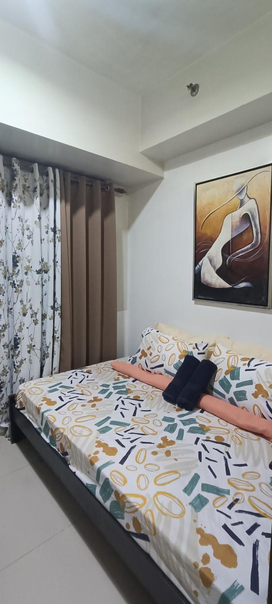 Amigo'S Place At Sea Residences Manille Extérieur photo
